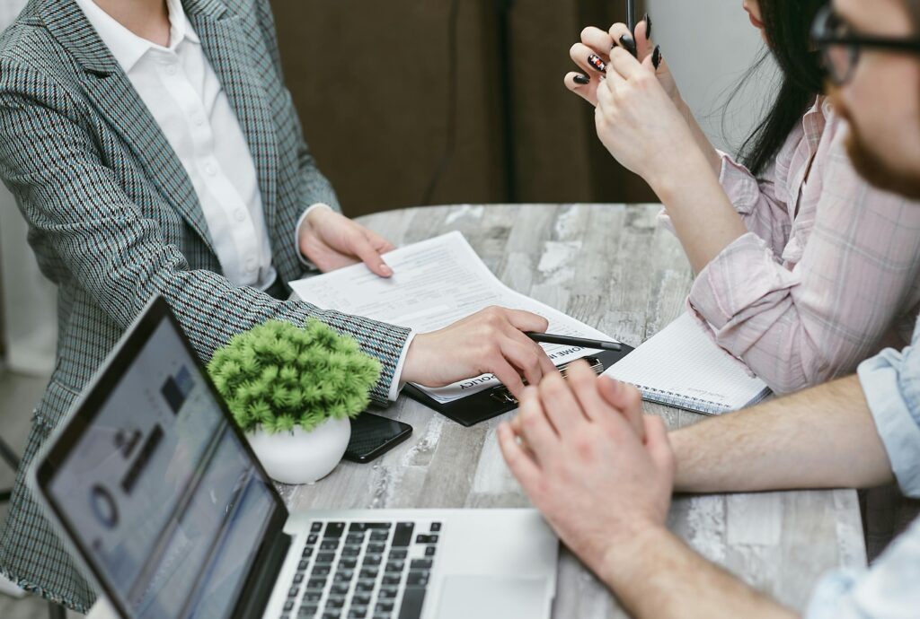 Financial advisor explaining how important recession-proofing is